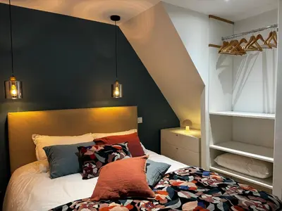 Un ou plusieurs lits dans un hébergement de l'établissement Cozy Niort