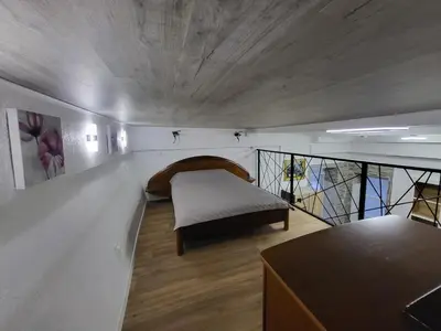 Un ou plusieurs lits dans un hébergement de l'établissement Duplex KeLi