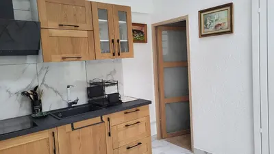 Cuisine ou kitchenette dans l'établissement Duplex KeLi