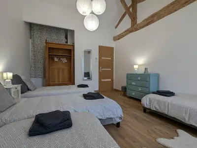 Un ou plusieurs lits dans un hébergement de l'établissement La Grange - La Grange des Colporteurs