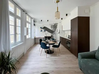 Coin salon dans l'établissement L'Escale d'Audry - Appartement sur cour situé en plein coeur de ville