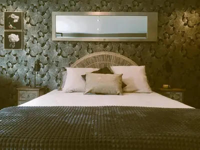 Un ou plusieurs lits dans un hébergement de l'établissement La chambre d'Hôt'ize