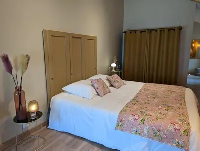 Un ou plusieurs lits dans un hébergement de l'établissement LA VINCELLA Gîte de charme , proche d'Angoulême, 3 chambres