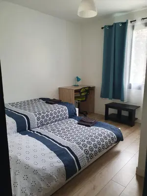 Un ou plusieurs lits dans un hébergement de l'établissement Villa Angoulême
