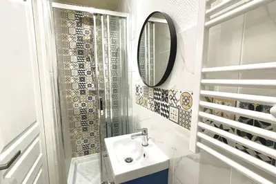 Salle de bains dans l'établissement La Petite Fleur - Centre ville