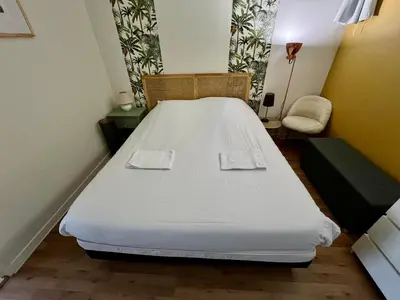 Un ou plusieurs lits dans un hébergement de l'établissement Le Saint-Hilaire - appartement calme + parking