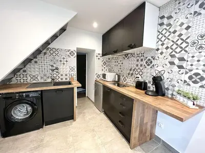 Cuisine ou kitchenette dans l'établissement Studio tout équipé avec parking
