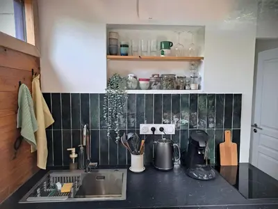 Cuisine ou kitchenette dans l'établissement La Cabane des Dunes - Parking privatif