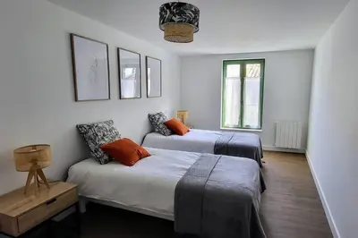 Un ou plusieurs lits dans un hébergement de l'établissement Appartement 2 chambres - 6 personnes - Centre de Parthenay - Garage et Wifi