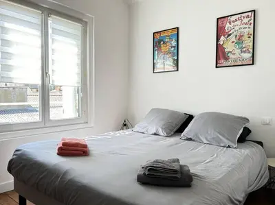 Un ou plusieurs lits dans un hébergement de l'établissement Parthenay Centre-Ville - Maison avec 1 chambre