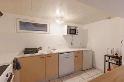 Cuisine ou kitchenette dans l'établissement LE SOUVENIR D'AILLEURS T2 65m2