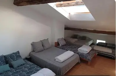 Un ou plusieurs lits dans un hébergement de l'établissement Les chambres du Nid charentais