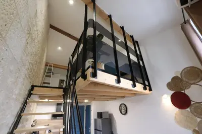 Un ou plusieurs lits dans un hébergement de l'établissement Le duplex du 71 B