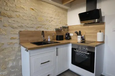 Cuisine ou kitchenette dans l'établissement Le duplex du 71 B
