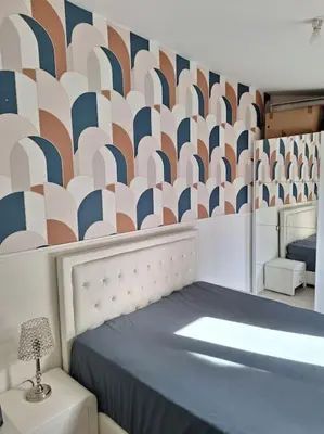 Un ou plusieurs lits dans un hébergement de l'établissement Belle maison au bord du plan d'eau