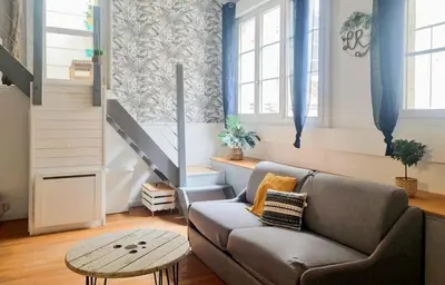 Coin salon dans l'établissement Fleuriau cozy boheme Proche marché & Vieux Port