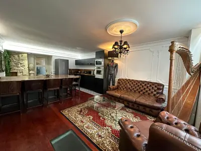Coin salon dans l'établissement Élégant appartement de ville avec patio