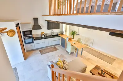 Cuisine ou kitchenette dans l'établissement La Rocque