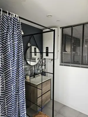 Cuisine ou kitchenette dans l'établissement Petit Appart proche IMA