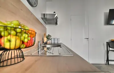 Cuisine ou kitchenette dans l'établissement Paradis Bleu - Coeur de ville, Tv 4K, Netflix, Fibre, Confortable, Calme