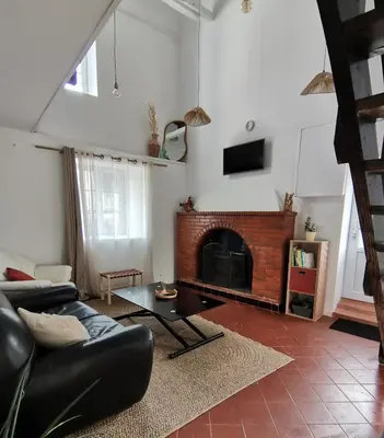 Télévision ou salle de divertissement dans l'établissement Épi Cottage