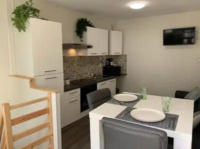Cuisine ou kitchenette dans l'établissement Le cocon T2 duplex 24 m2