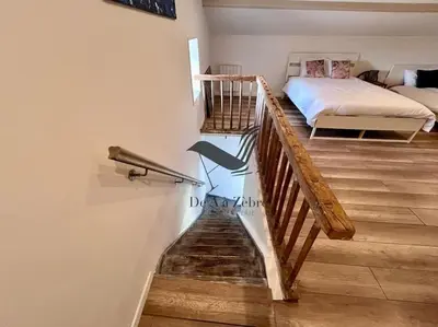 Un ou plusieurs lits dans un hébergement de l'établissement Le Nid Marin - Spacieuse maison avec jardin