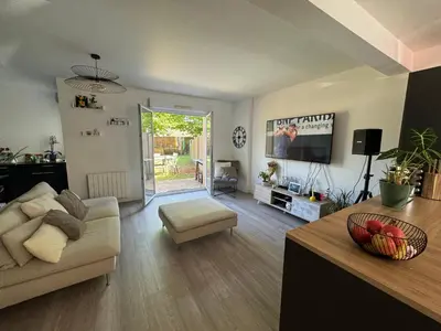 Coin salon dans l'établissement La Petite Citadine Proche Futuroscope
