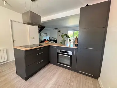 Cuisine ou kitchenette dans l'établissement La Petite Citadine Proche Futuroscope