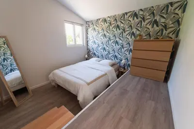 Un ou plusieurs lits dans un hébergement de l'établissement Le Grand Verger : gîte familial avec piscine