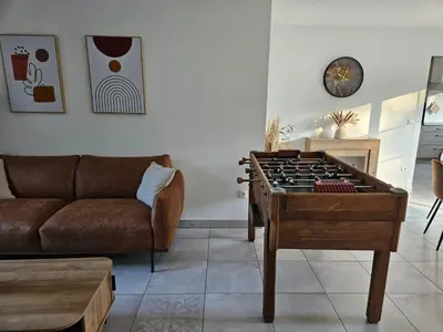 Coin salon dans l'établissement jolie maison centre bourg