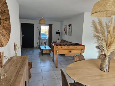 Coin salon dans l'établissement jolie maison centre bourg