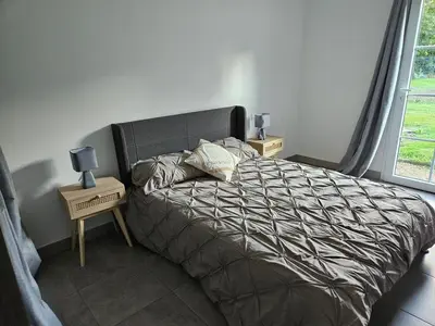 Un ou plusieurs lits dans un hébergement de l'établissement jolie maison centre bourg