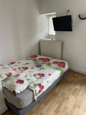 Un ou plusieurs lits dans un hébergement de l'établissement Studio central cosy proche gare