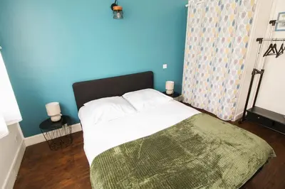 Un ou plusieurs lits dans un hébergement de l'établissement NEW! St Martin 52B -Grand studio lumineux - wifi
