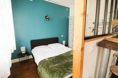 Un ou plusieurs lits dans un hébergement de l'établissement NEW! St Martin 52B -Grand studio lumineux - wifi