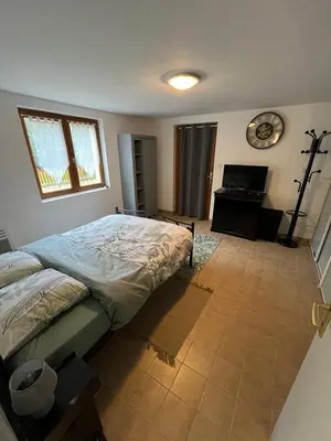 Un ou plusieurs lits dans un hébergement de l'établissement Logement paisible en bord de Vienne