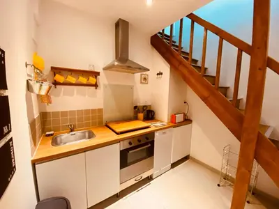 Cuisine ou kitchenette dans l'établissement Gites Rue Du Chateau