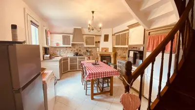 Cuisine ou kitchenette dans l'établissement Gites Rue Du Chateau