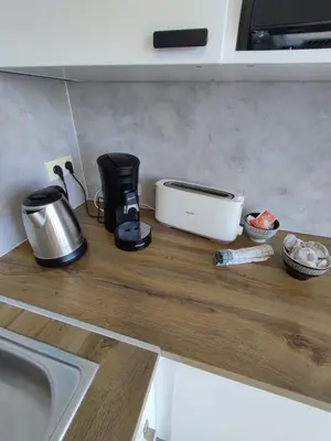 Cuisine ou kitchenette dans l'établissement Le Bury Agréable studio avec garage et superbe vue