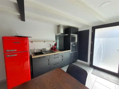 Cuisine ou kitchenette dans l'établissement Love room avec spa privatif