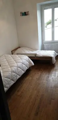 Un ou plusieurs lits dans un hébergement de l'établissement Maison de maître