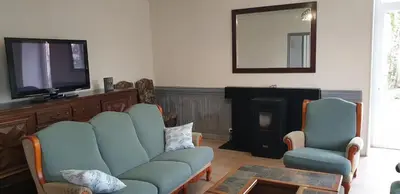 Télévision ou salle de divertissement dans l'établissement Maison de maître