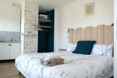 Un ou plusieurs lits dans un hébergement de l'établissement Chambre dhôtes familiale à Saint Pierre du Chemin