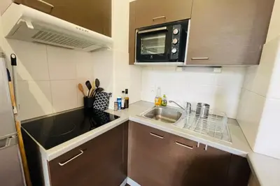 Cuisine ou kitchenette dans l'établissement L’Appart’