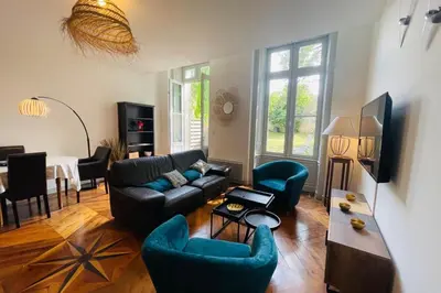 Télévision ou salle de divertissement dans l'établissement L’Appart’