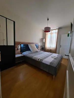 Un ou plusieurs lits dans un hébergement de l'établissement Maison le trèfle