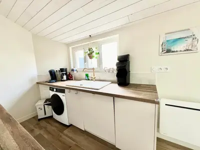 Cuisine ou kitchenette dans l'établissement Charmante Maison de Ville - Patio - Wifi - Parking gratuit