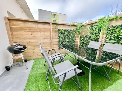 Jardin de l'établissement Charmante Maison de Ville - Patio - Wifi - Parking gratuit