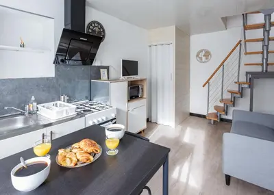 Cuisine ou kitchenette dans l'établissement LE REPAIRE - T2 23 m2